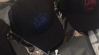 three black hats with the word holly on them