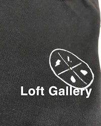 a black sweatshirt with a white logo on it