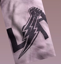 a white t - shirt with a lightning bolt on it
